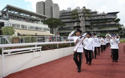 The Hong Kong Police Silver Band salutes Club Stewards and officiating guests.
