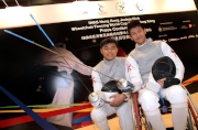 Photos 2, 3:<br>
Demonstration by HKSAR Wheelchair Fencing Team members Leung Siu Lung (right) and Ng Chi Fung (left). 