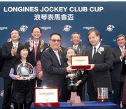Photo 10, 11, 12<br> Charles Villoz, Vice President and Head of International Sales of LONGINES International, and Karen Au Yeung, Vice President of LONGINES HK, present watches from The LONGINES Saint-Imier Collection to Howard Liang Yum Shing, Owner of race winner California Memory, trainer Tony Cruz and jockey Matthew Chadwick.