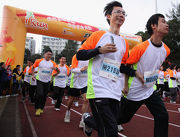 About 2,000 athletes with disabilities and pair-up runners participate in the i-Run aᡧ Hong Kong Jockey Club Special Marathon 2013 to promote social inclusion.