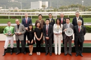 HKJC Stewards, CEO Winfried Engelbrecht-Bresges and winning connections of Military Attack take a group photo at the presentation ceremony of the Premier Plate.