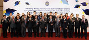 Front row: Club Chairman T Brian Stevenson (centre); HKPC & SAPD President Dr York Chow (6th right); Club Steward Philip N L Chen (2nd right); Chief Executive Officer Winfried Engelbrecht-Bresges (1st right); City University of Hong Kong President Prof Way Kuo (1st left); The University of Hong Kong Vice-Chancellor and President Prof Lap-chee Tsui (3rd right); The Hong Kong Academy for Performing Arts Director Prof Adrian Walter (5th right); Hong Kong Baptist University Vice-President (Research and Development) Prof Rick Wong (4th right); Lingnan University Associate Vice President (Student Affairs) Prof Lee Hung-kai (3rd left); The Chinese University of Hong Kong Pro-Vice-Chancellor Prof Fok Tai Fai (5th left); The Hong Kong Institute of Education Acting President Prof John Lee (4th left); The Hong Kong Polytechnic University Deputy President & Provost Prof Philip Chan (2nd left); Hong Kong University of Science & Technology Vice President for Research and Graduate Studies Prof Joseph Lee (6th left) with graduating Scholars.  