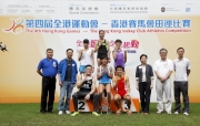 The Cluba?s Executive Manager, Charities, Florine Tang (3rd right), Secretary for Justice Rimsky Yuen (2nd left), Kwun Tong District Council member Ben Chan (1st left) with other guests and winners at the athletics competition held on 19 May.
