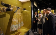 Photos 3/4:<br>
Guests tour a?The Splendours of Royal Costume: Qing Court Attirea? exhibition.