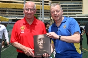 The Cluba?s Chief Executive Officer Winfried Engelbrecht-Bresges (right) receives a souvenir, the autobiography My Life in Football from Sir Bobby Charlton (left). 