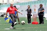 Photos 8, 9:
Sir Bobby Charlton (Photo 8 left) demonstrates football techniques to young football players of the Jockey Club Elite Youth Football Camp.