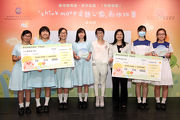 The Cluba?s Executive Manager, Charities, Imelda Chan (3rd right), illustrator of the McMug and McDull character, Alice Mak (4th right) and The Best Concept Award winners.
