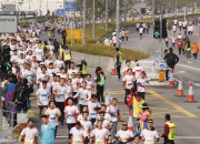 Some 2,500 athletes with disabilities and pair-up runners participate in the a?i-Run aᡧ Hong Kong Jockey Club Special Marathon 2014a? to promote social inclusion. 