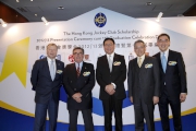 Club Chairman T. Brian Stevenson (2nd left), Professor Frederick Ma (centre), Club Steward Anthony W K Chow (2nd right), the Cluba?s Chief Executive Officer Winfried Engelbrecht-Bresges (1st left) and Executive Director, Charities, Douglas So (1st right).