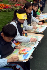 Photos 10, 11:<br>
Students create their entries for the Jockey Club Student Drawing Competition.