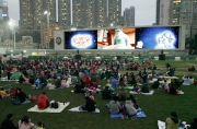 Photos 3, 4:<br>
Over 2,000 Club staff, their families and friends enjoy the movies shown on the giant Diamond Vision screen at Happy Valley Racecourse.