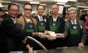 Photos 2 /3 /4 /5:<br>
Club Steward Dr Eric Li Ka Cheung (Photo 2, 1st right), Secretary for the Environment Wong Kam-sing (Photo 2, 2nd right), Bo Charity Foundation Honorary Chairman Anthony Leung (Photo 2, centre) Food Angel Ambassador Jacky Cheung (Photo 2, 2nd left) and 2013 Golfers Caring Action representative Daniel Liu (Photo 2, 1st left) help fill and distribute meal boxes for the Food Angel Jockey Club Food Rescue and Hot Meal Assistance Programme.