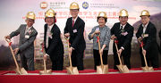 Club Steward Philip N L Chen (3rd left) joins HSMC Board Chairman Rose Lee (3rd right), President Professor Simon Ho (2nd right), Steering Committee Chairman Martin Tam (2nd left) and other guests to perform the groundbreaking ceremony of the HSMC Jockey Club Student Residence Halls. 