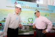 Club Steward Anthony W K Chow (right) pictured with Executive Director, Charities, Douglas So (left) at the complex model. 